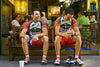 Todd Herriott of Colavita outside of a cafe in New York City in cycling kit with his teammate.