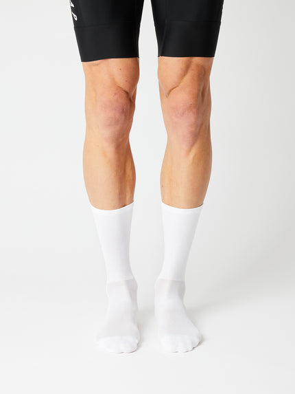 A pair of Fingerscrossed Classic road cycling socks in White