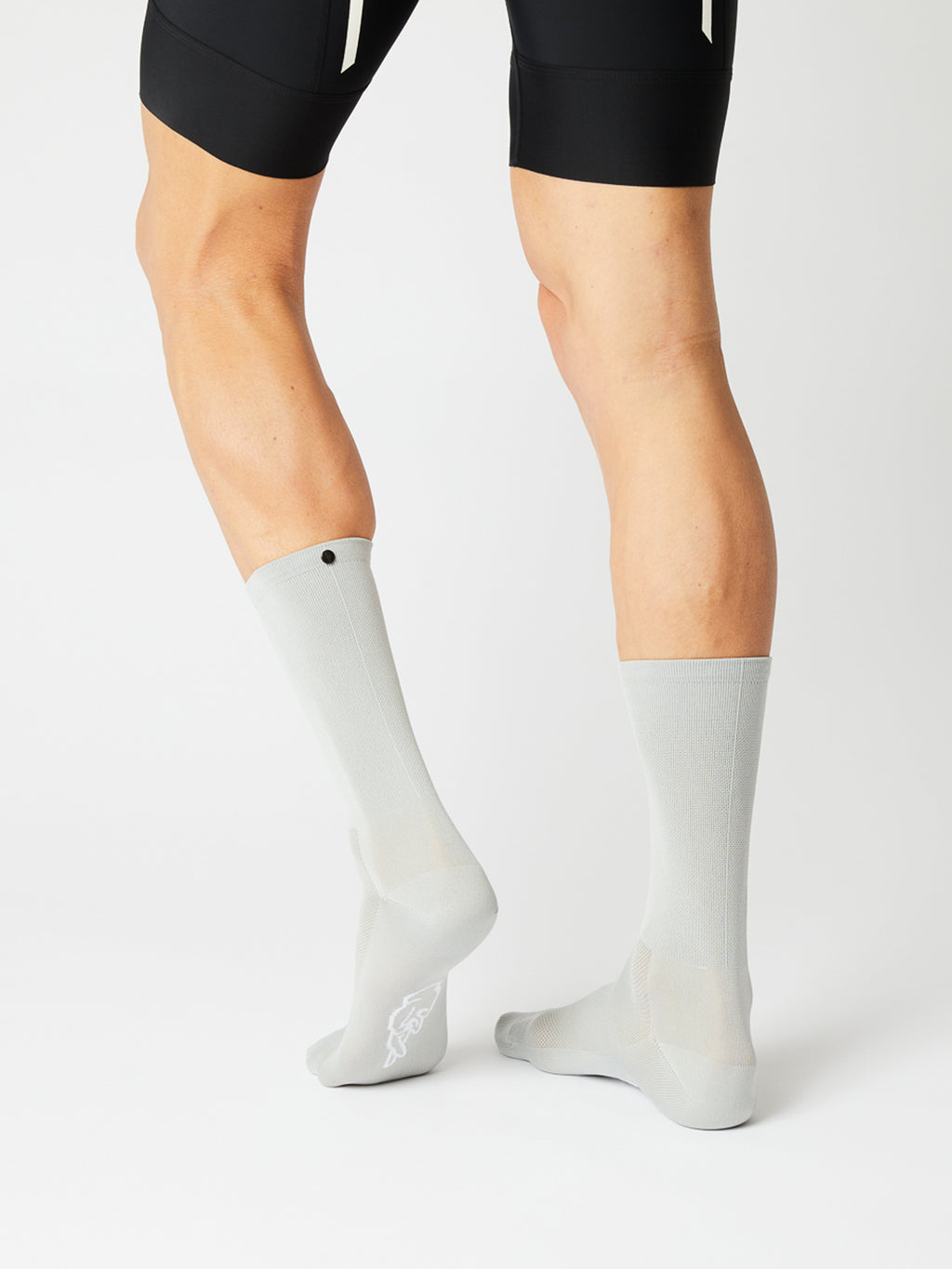 A pair of Fingerscrossed Classic road cycling socks in Silver