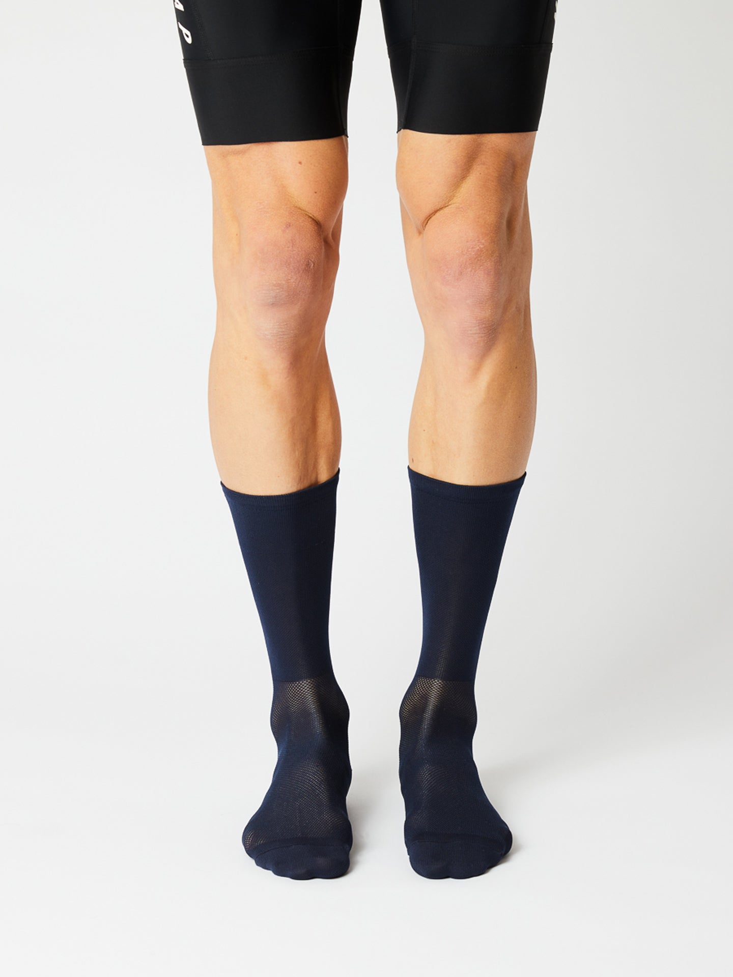 A pair of Classic Fingerscrossed road cycling socks in Navy Blue