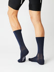 A pair of classic Fingerscrossed road cycling socks in Navy blue viewed from the side