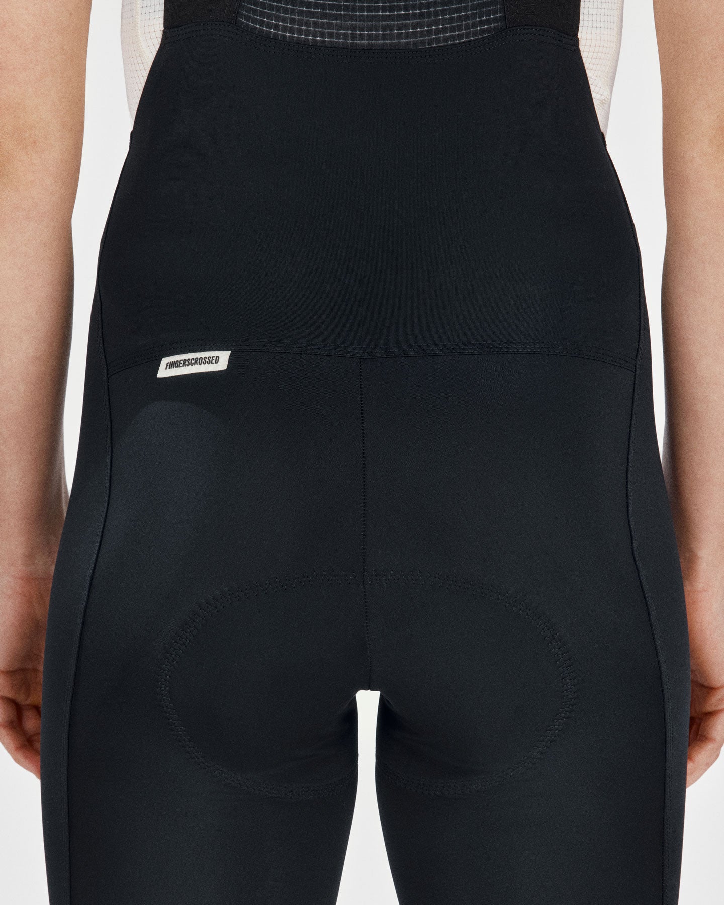 A close up of the back of a Fingerscrossed #Road Women's Cycling Bib Short in Black