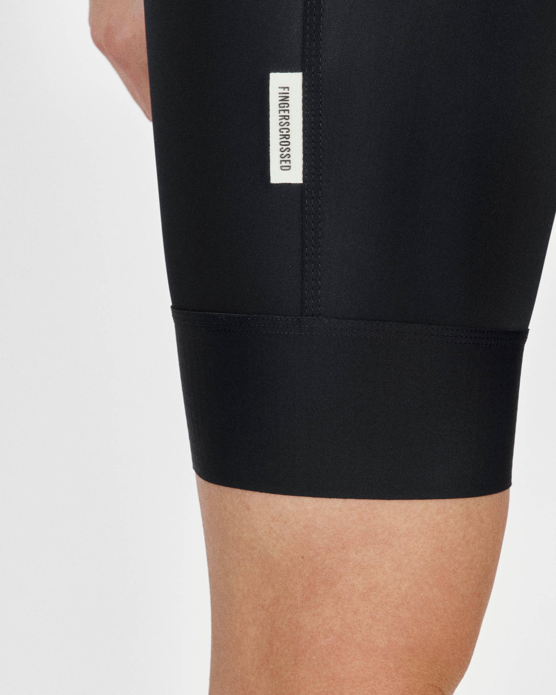 A close up of the leg and gripper of a Fingerscrossed #Road Women's Cycling Bib Short in Black
