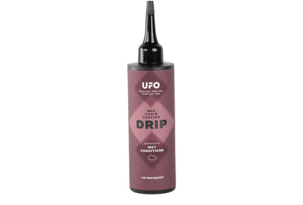 A bottle of Ceramic Speed UFO drip Wax chain lube for bicycles and in wet conditions 