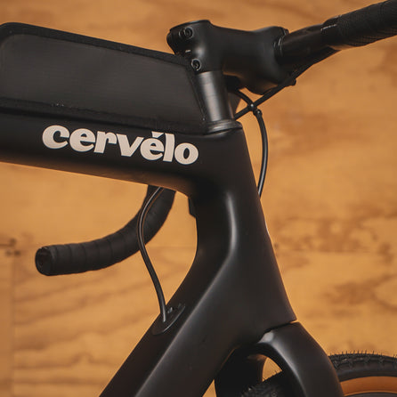 A Cervelo Aspero in Five Black with Top Tube Bag for Rent