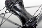 A close up of Partington Carbon Hubs on an R-Series MKII Wheel
