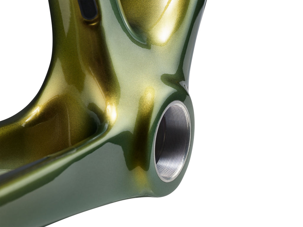 The threaded bottom bracket of an Enve Fray endurance road bike in the venom color