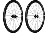 A pair of Enve Foundation 45 carbon fiber disc road racing rear wheel with black Enve logos