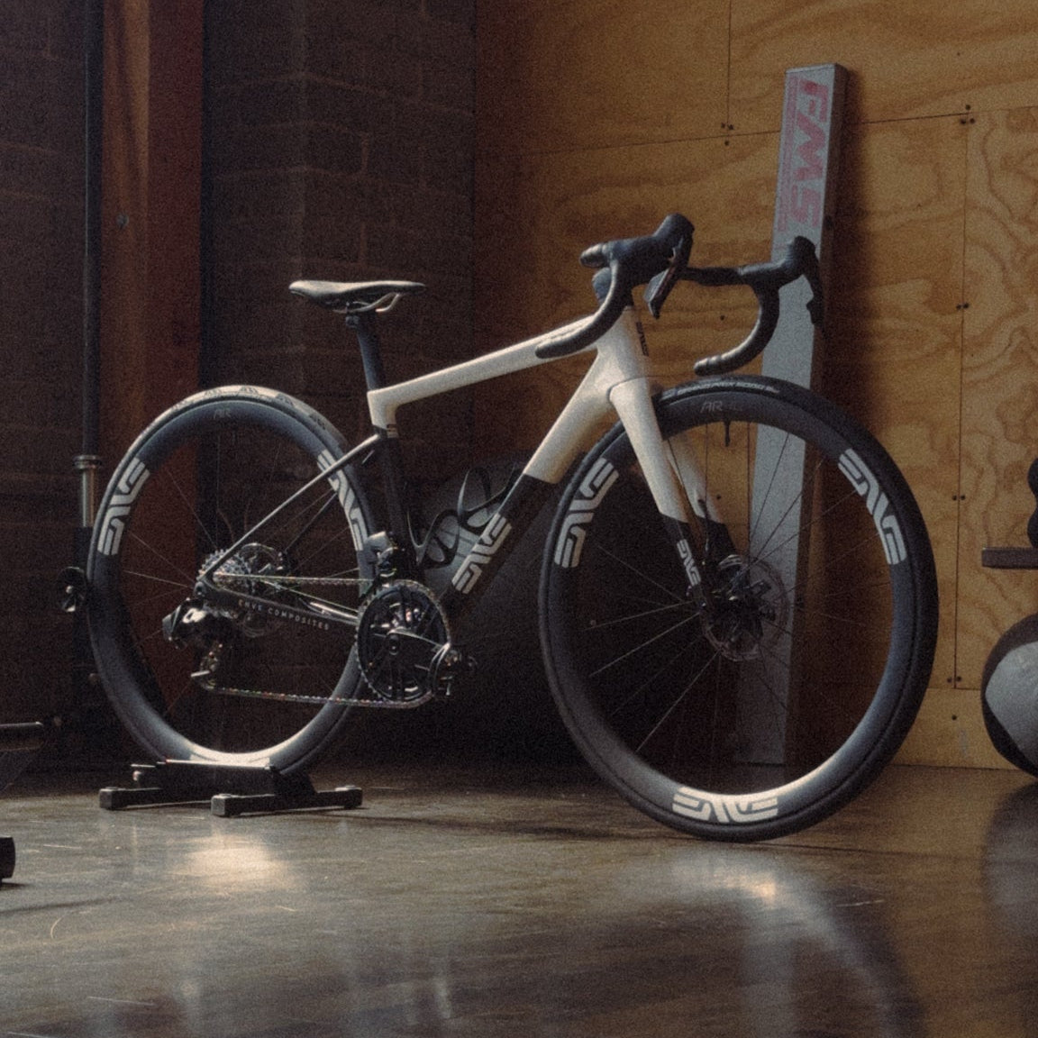 An Enve Melee in Aspen White in a plywood room at Metier Seattle