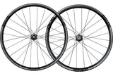 A pair of Enve SES 2.3 carbon fiber disc road climbing wheels with black Enve logos