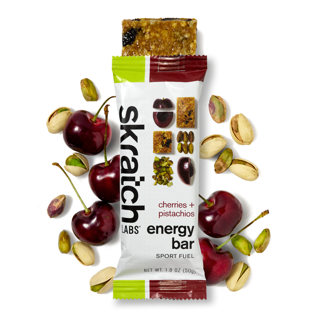 The front of a Skratch Labs cherries + pistachios energy bar sport fuel