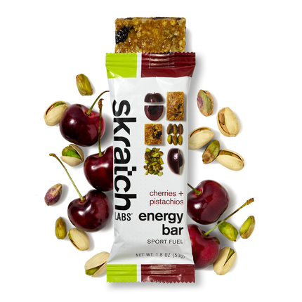 The front of a Skratch Labs cherries + pistachios energy bar sport fuel