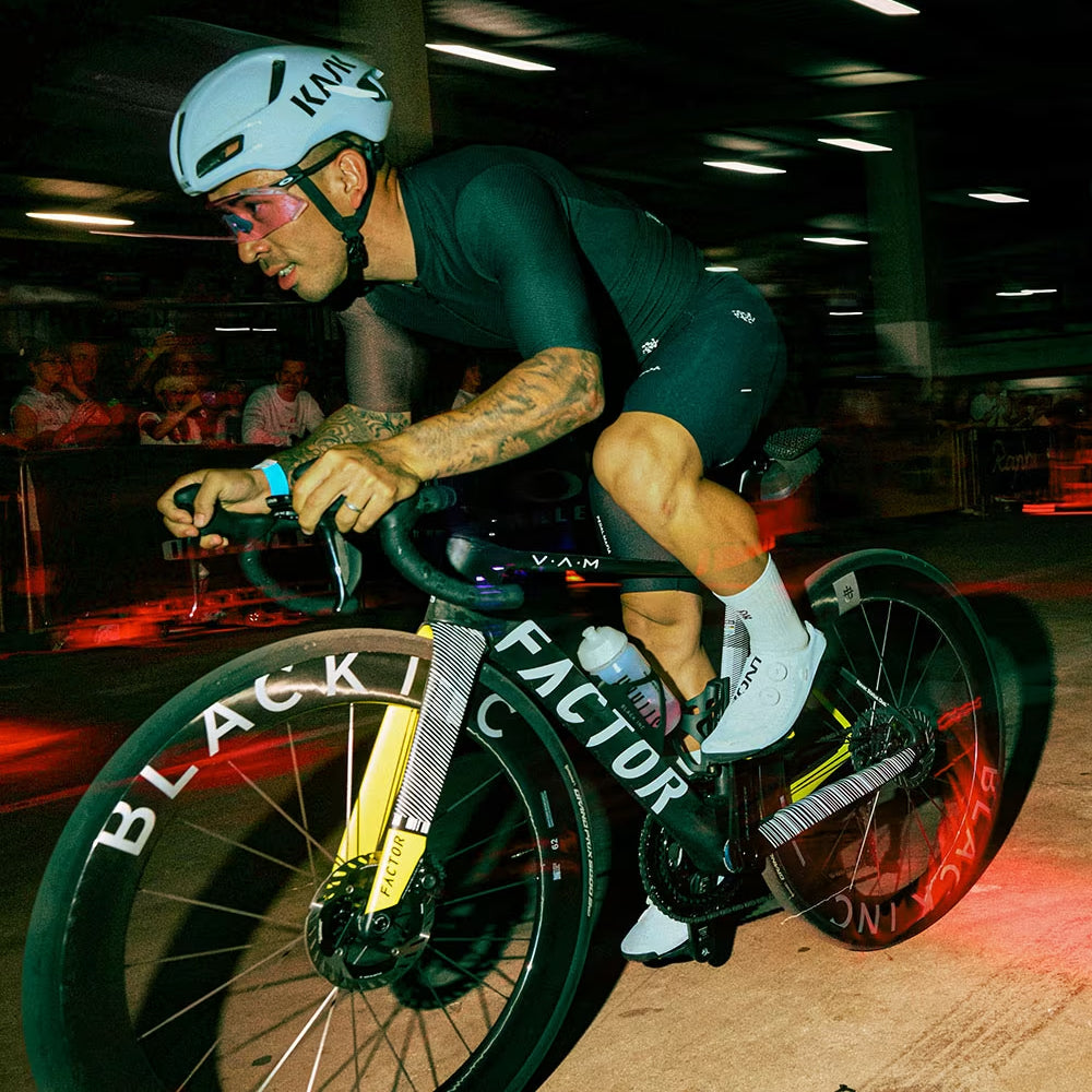 Caleb Ewan riding a factor OSTRO VAM in an indoor bike race