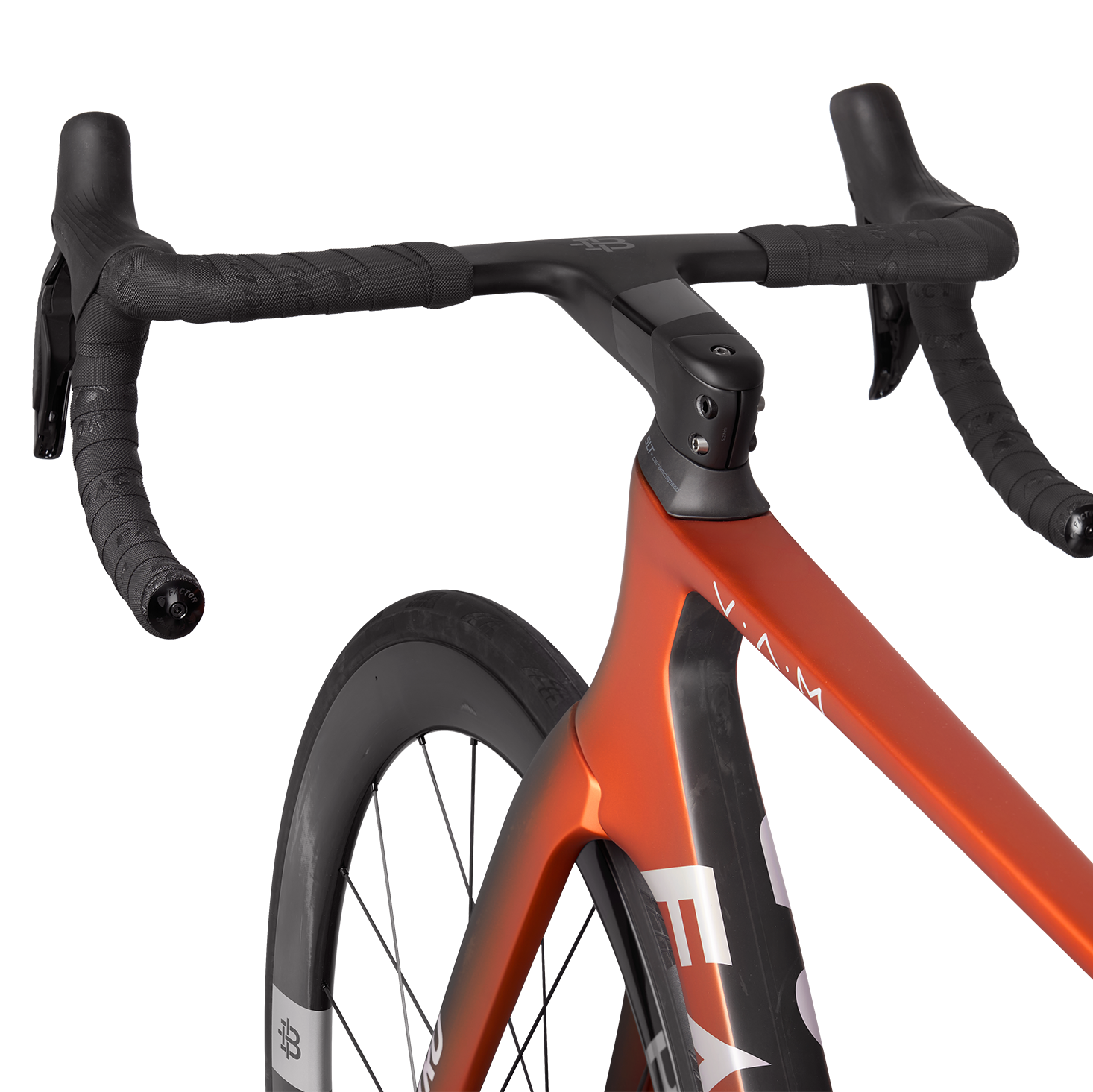 Close-up of a Factor OSTRO VAM with an orange frame and black handlebars 