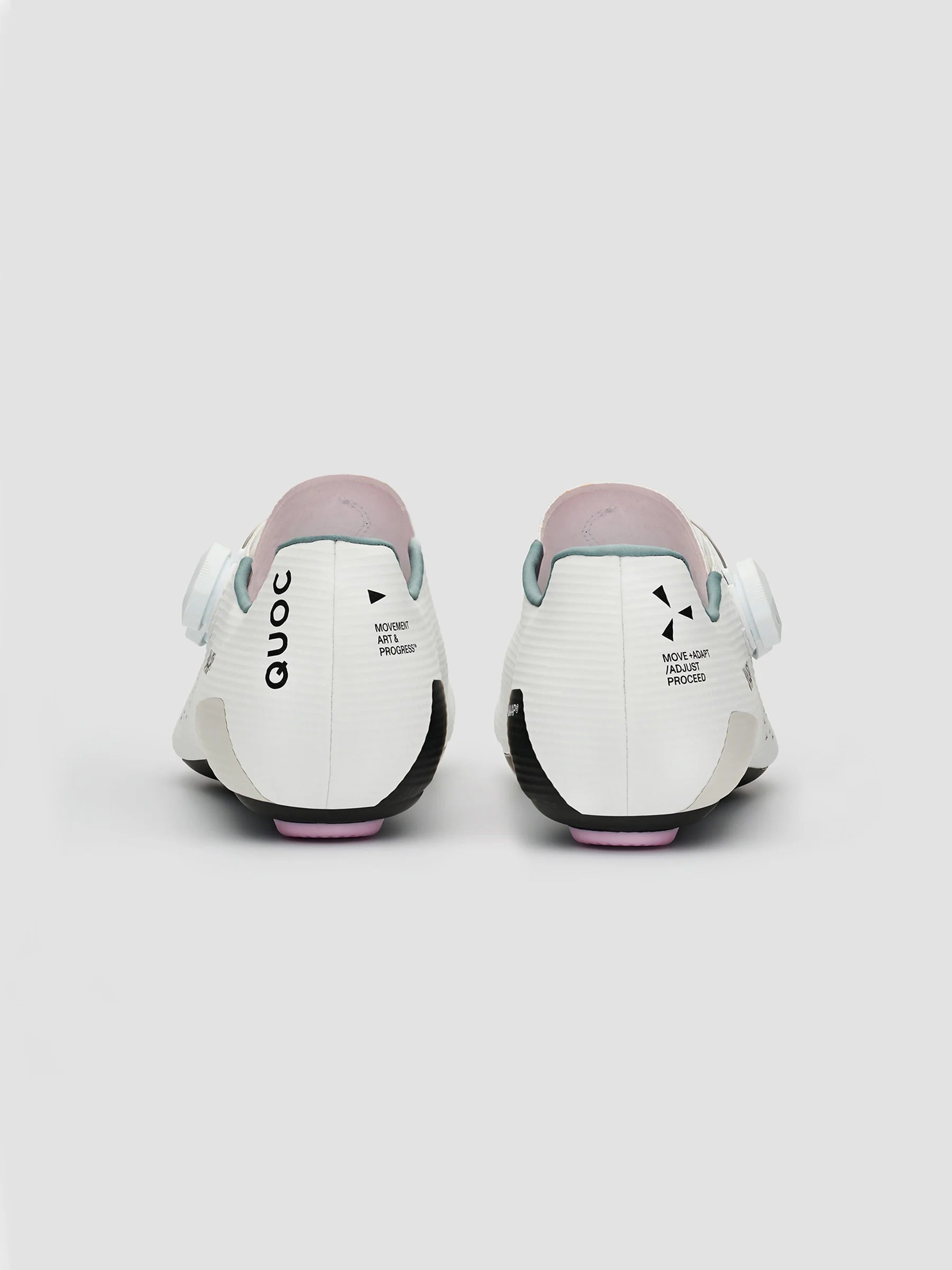 The heels of a pair of MAAP x QUOC M3 carbon road cycling shoes in white