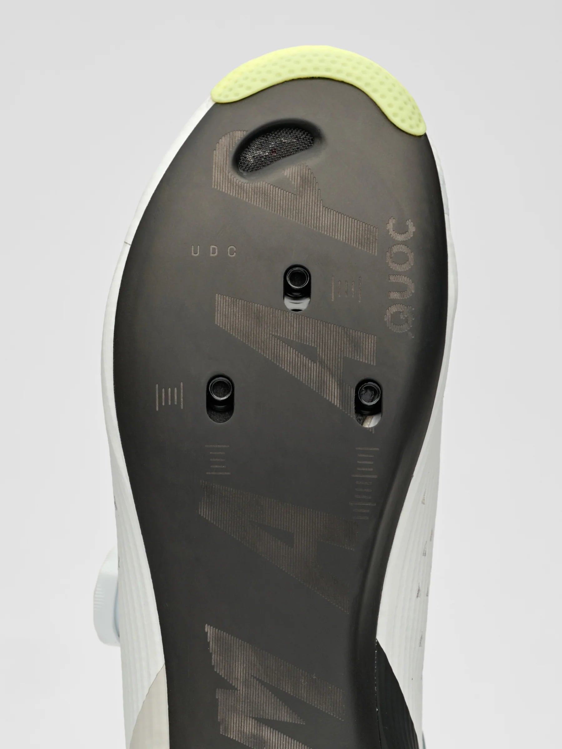 A detail shot of the clear interface on the carbon sole of a pair of MAAP x QUOC M3 carbon road cycling shoes