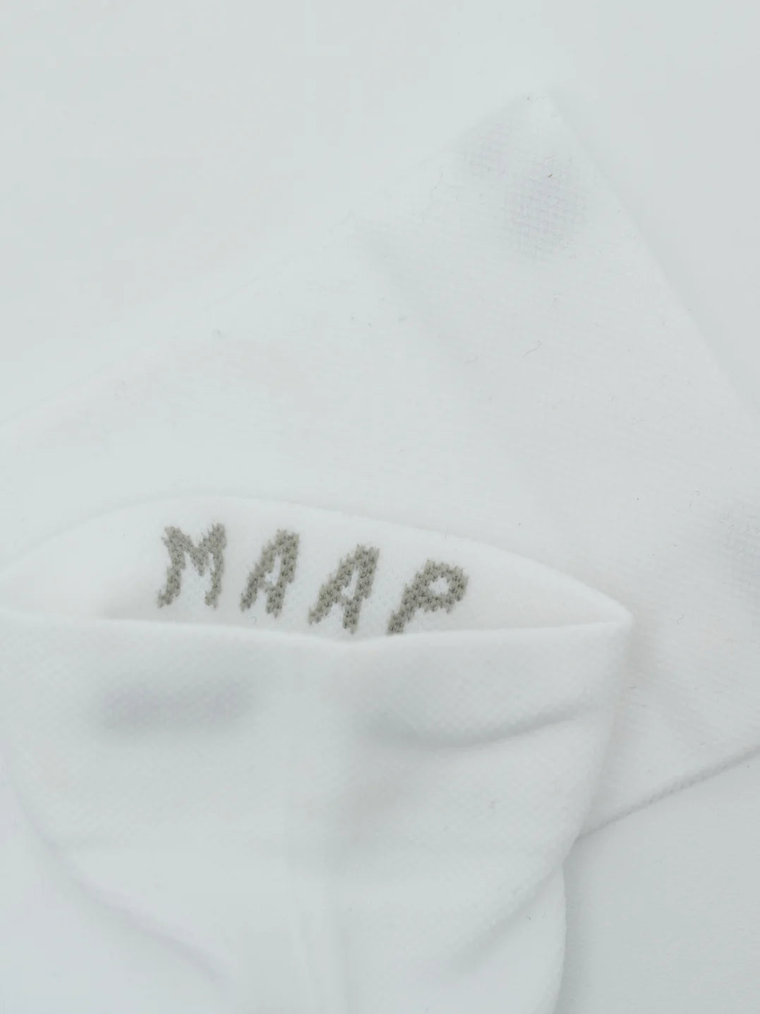 White Team Sock with 'MAAP' embroidery on a white background