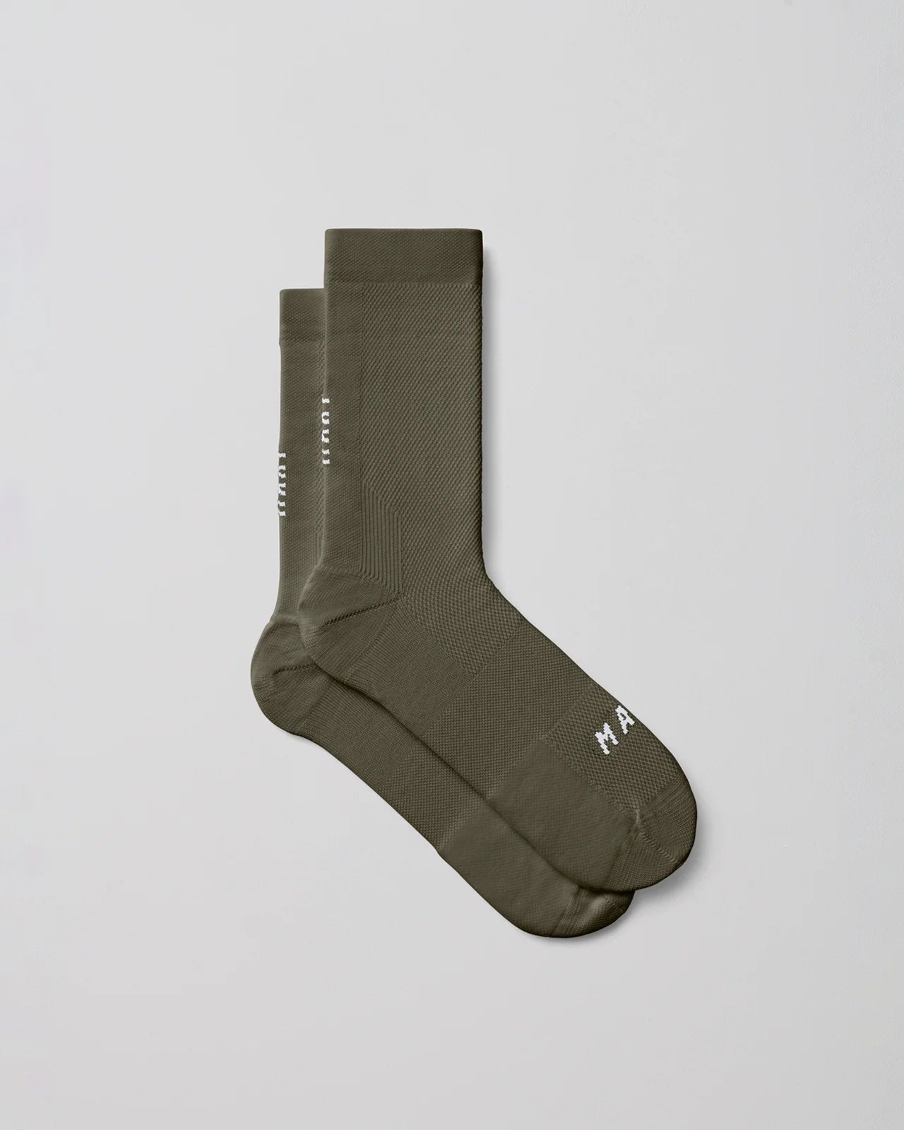 A pair of MAAP Division Mono Socks in olive with a white background