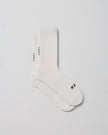 A pair of MAAP Division Mono Socks in White with a white background