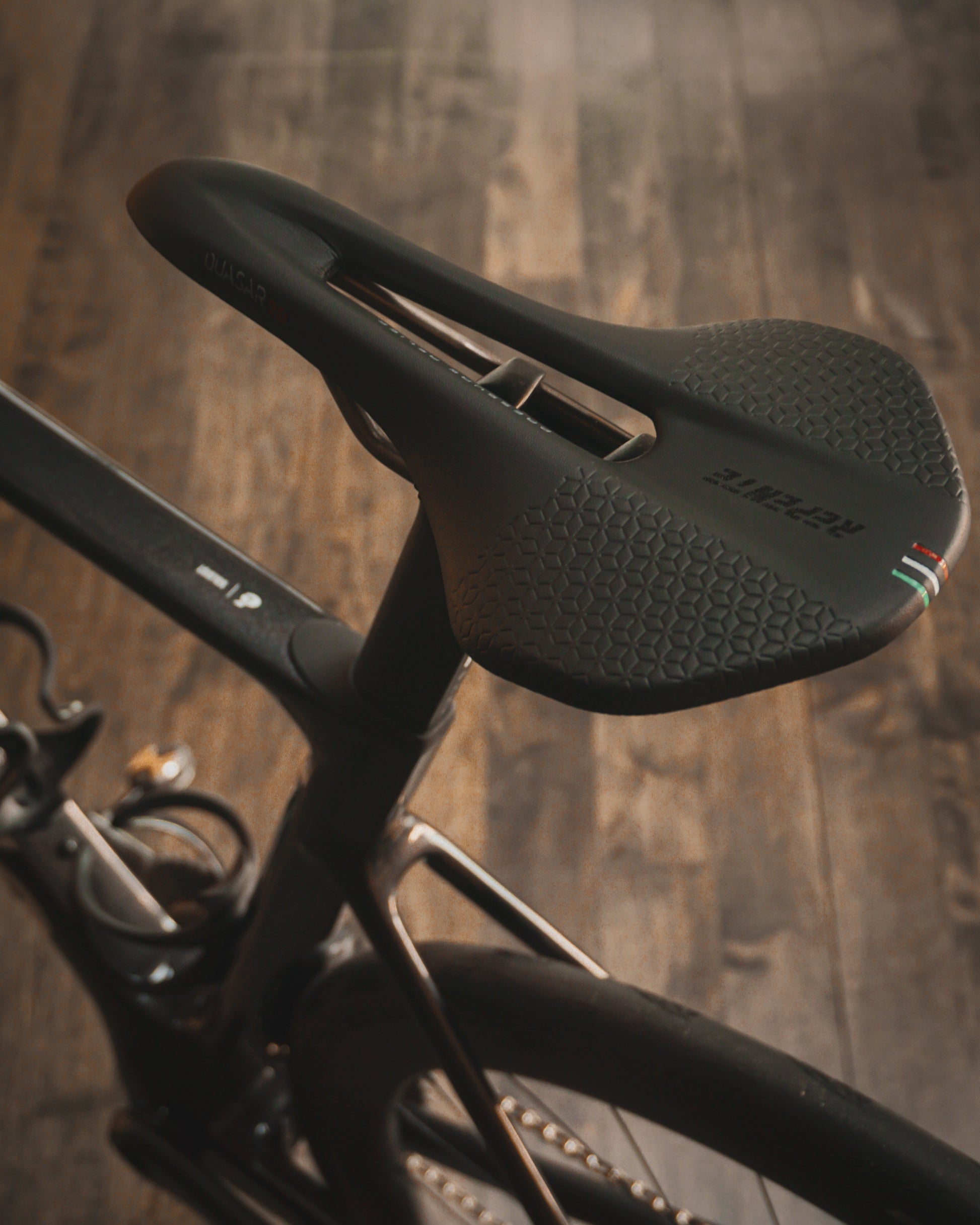 A close up of the Selle Italia saddle on a Cervelo Soloist road rental bike at Metier Cycling and Cafe.