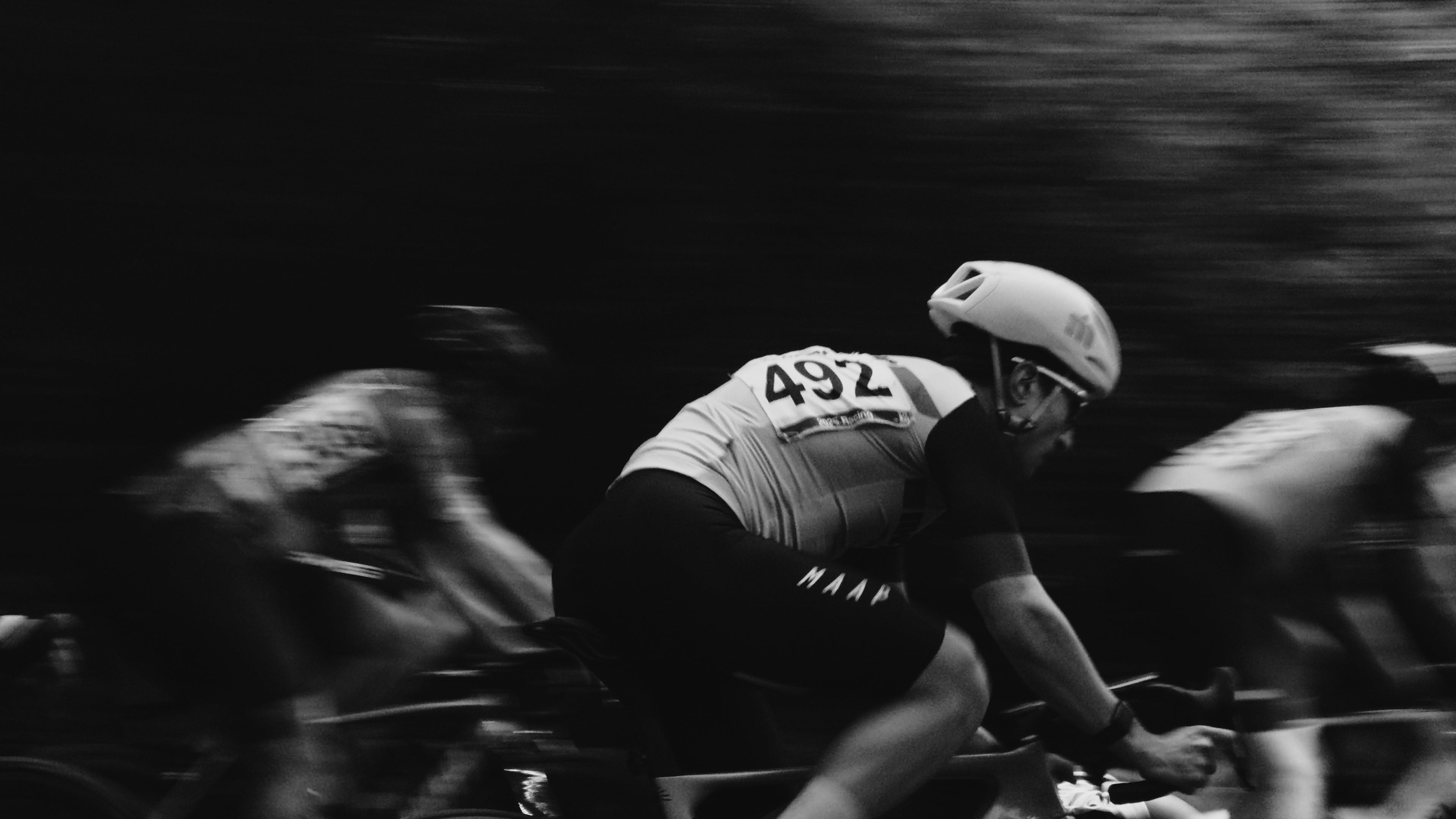 A Metier cycling club member racing their bike at the Seward Park Crit Race