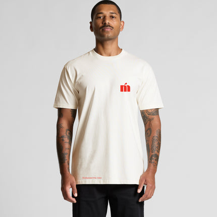 A man wearing a Métier Icon Tee in crème, front view