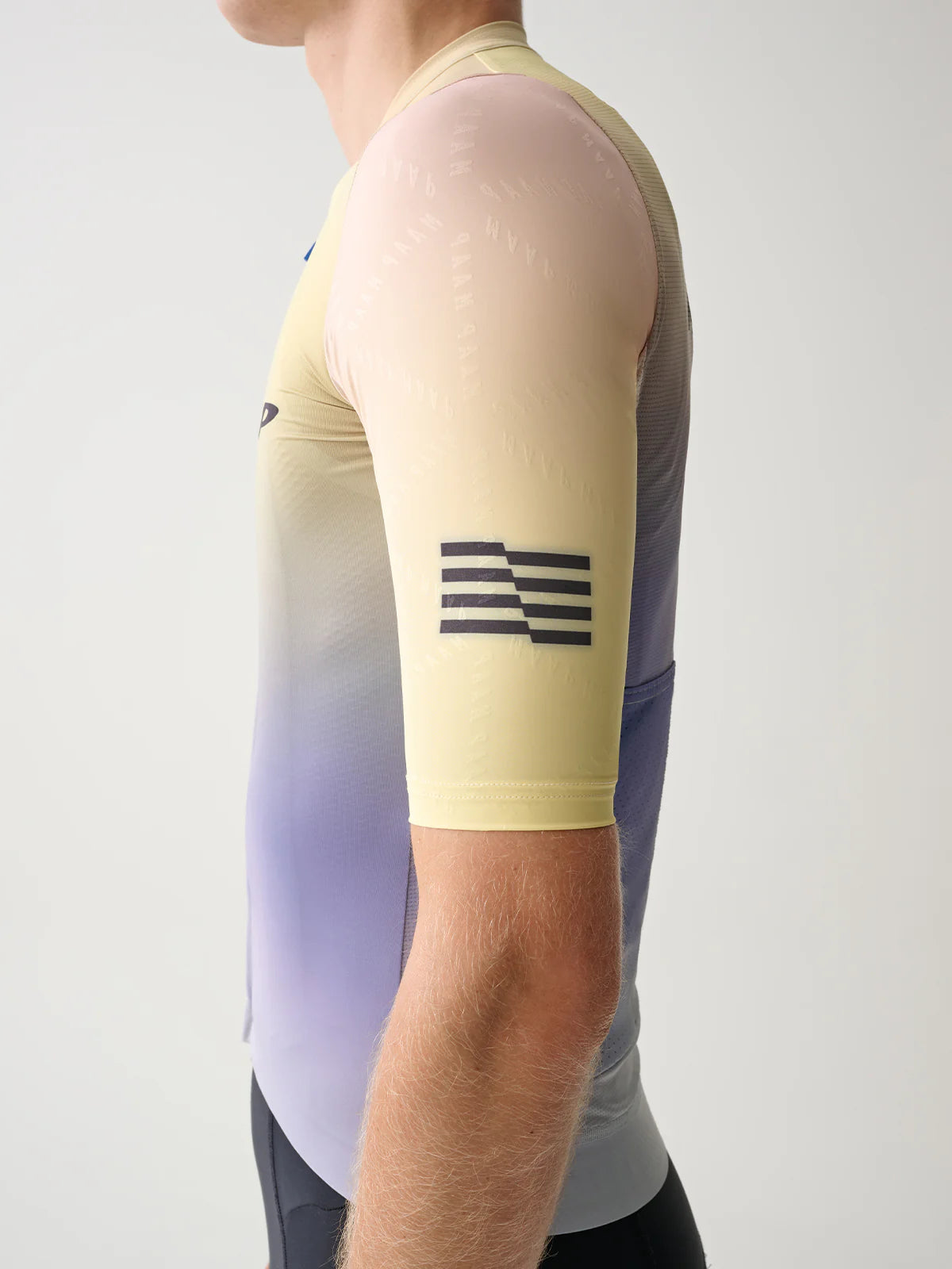 The MAAP emblem on the sleeve of the Men's Blurred Out 2.0 Pro Hex Short Sleeve Jersey in Shell Mix