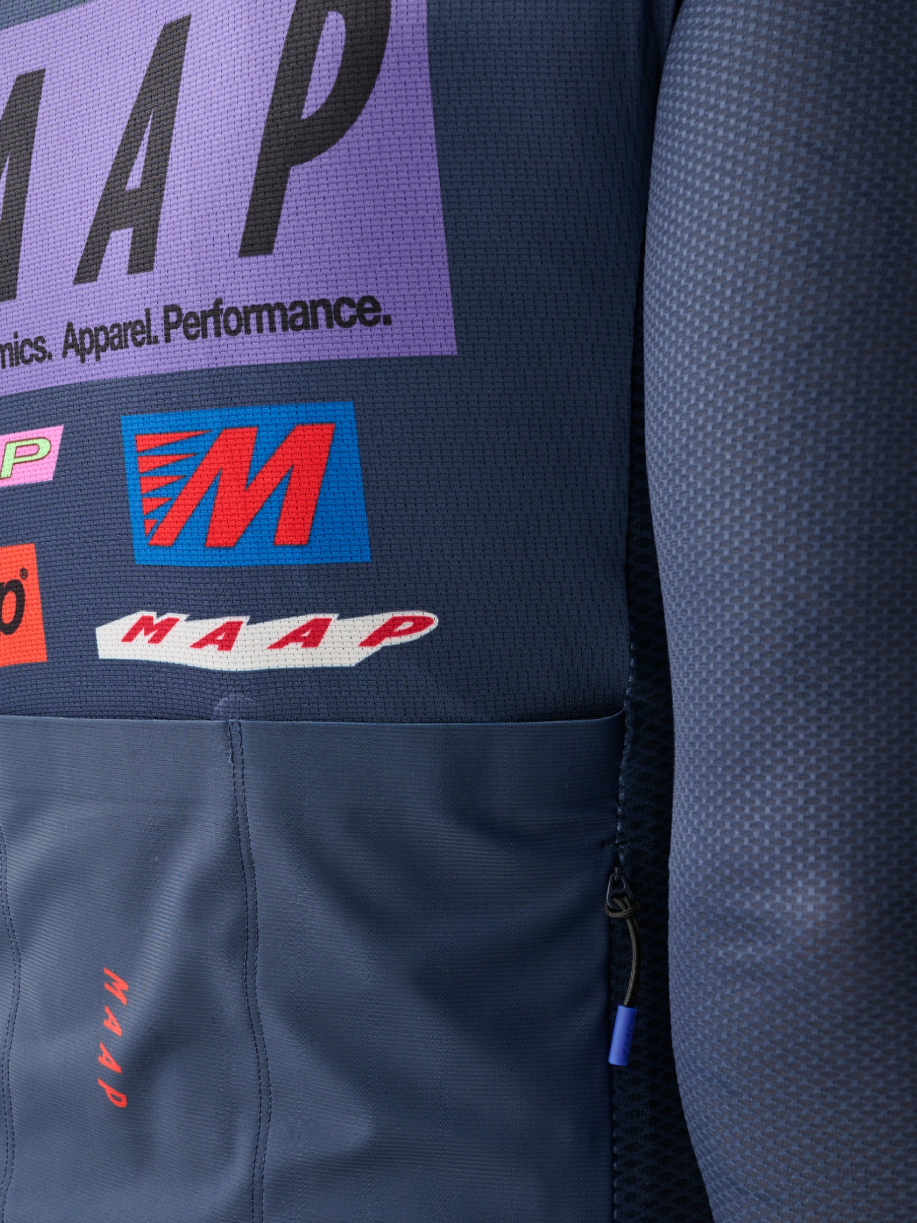 A detail image of the logos on the back of a Men's MAAP Drome Long Sleeve Jersey in Midnight Blue
