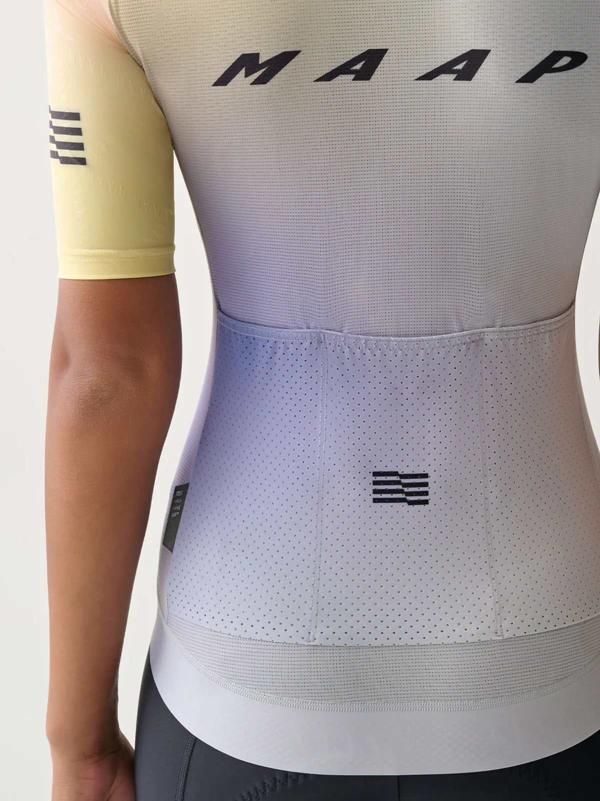 The mesh pocket detail on a MAAP Women's Blurred Out 2.0 Pro Hex Short Sleeve Jersey in Shell Mix