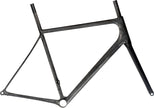 An Open MIN.D California Carbon Fiber Road Bicycle frameset with a raw carbon finish