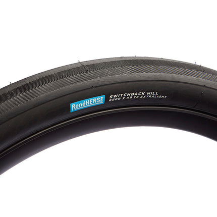 A Rene Herse Switchback Hill black 650b x 48 tc extralight tire for gravel bikes