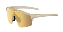 A pair of KOO Alibi sunglasses in sand matte with gold mirror lens