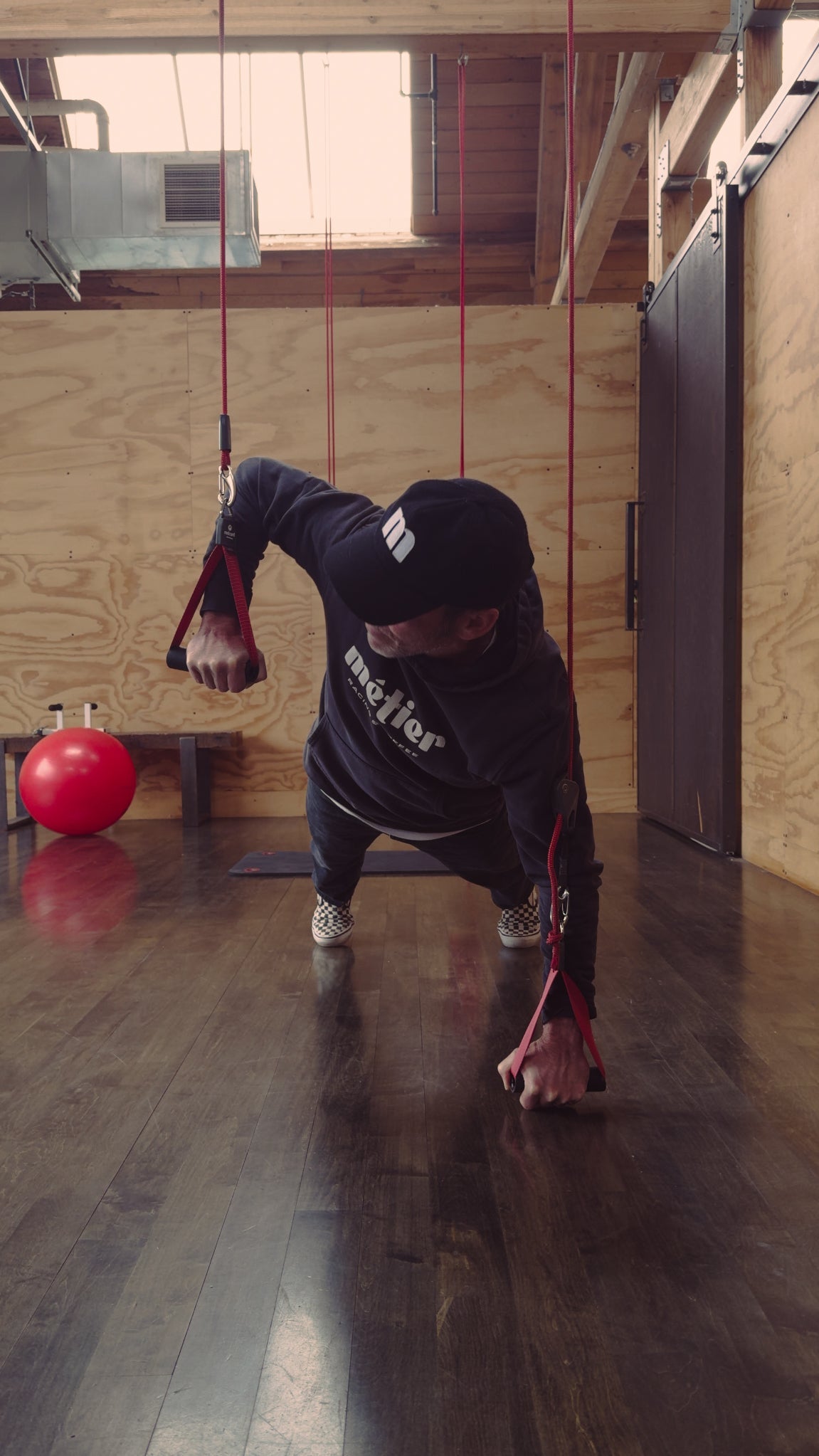 Cycling coach Todd Herriott of Metier demonstrating a core exercise on Red Cord