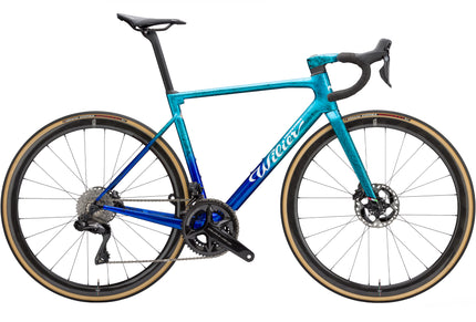 The side of a Wilier 0 SLR climbing road racing bike in the Astana Qazakstan 2023 Team colorway with Shimano Dura Ace Di2 groupset and Wilier Carbon wheels
