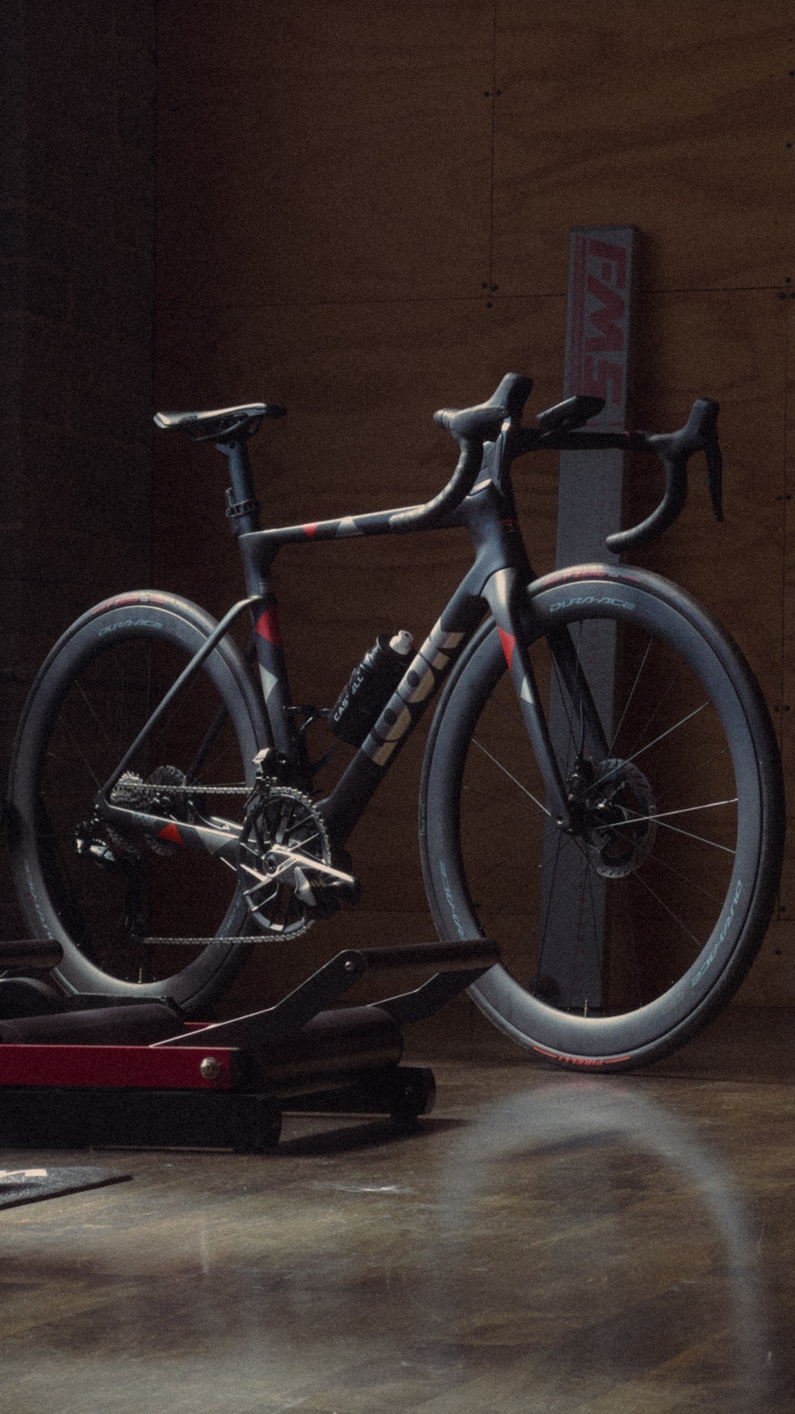 A Look Blade RS custom road bike in a plywood room at Metier