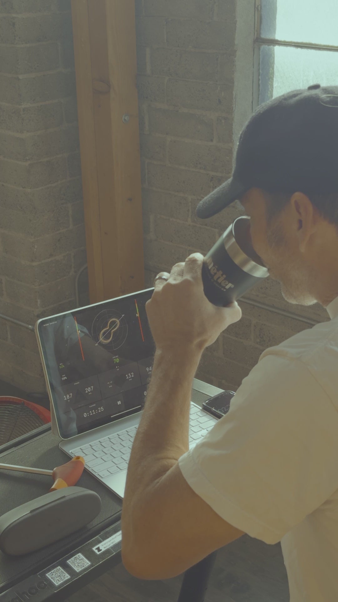 A montage of a cyclist completing a metabolic test and their coaches supervision, completing a gym exercise with instruction from their coach, and then riding their bike down a road.