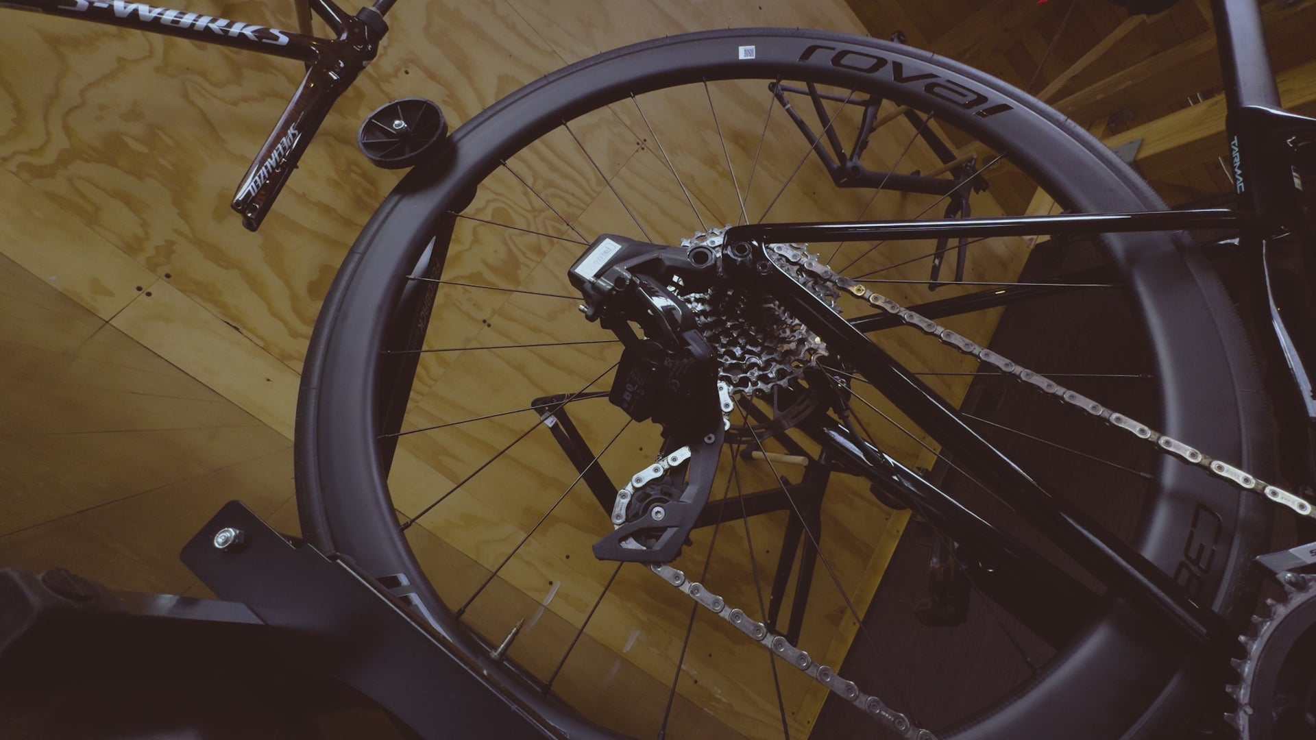 A Sram Rival rear detrailleur shifts up and down on an electronic-shifting equipped, carbon road rental bicycle in Seattle's Metier Cycling & Cafe