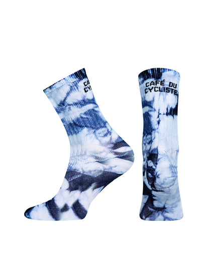 A pair of Cafe du Cycliste Tie Dye Socks in Navy and White